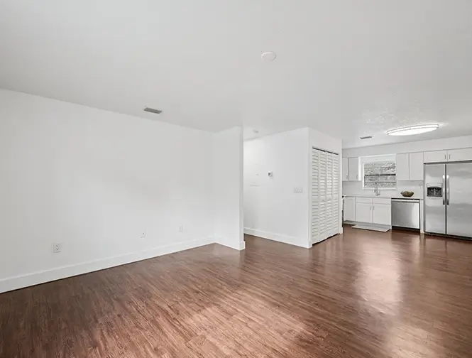 empty bedroom with wood flood