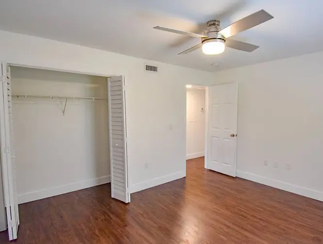 empty bedroom with wood flood