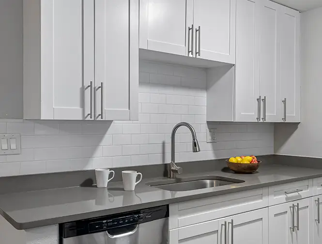 another view of the kitchen showing the sink